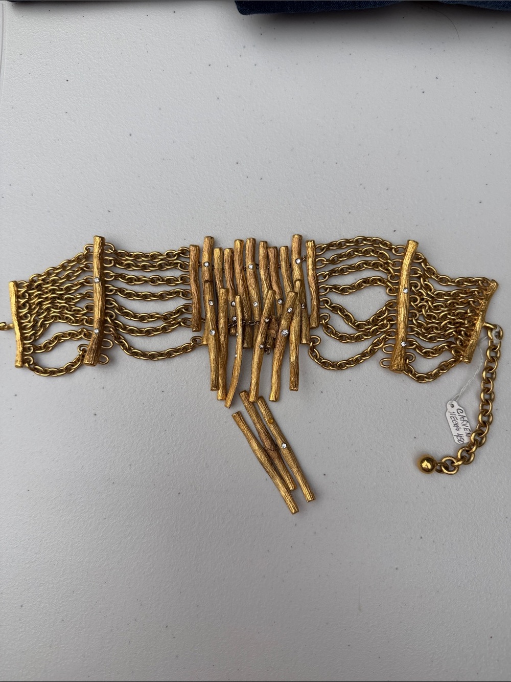 Gold Multi-Chain Statement choker with Textured Bars